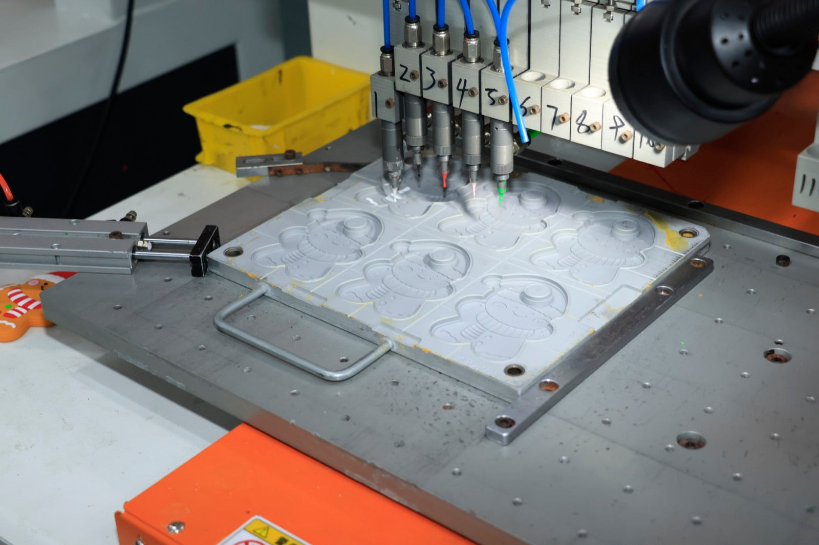 Silicone mold color dispensing and molding process